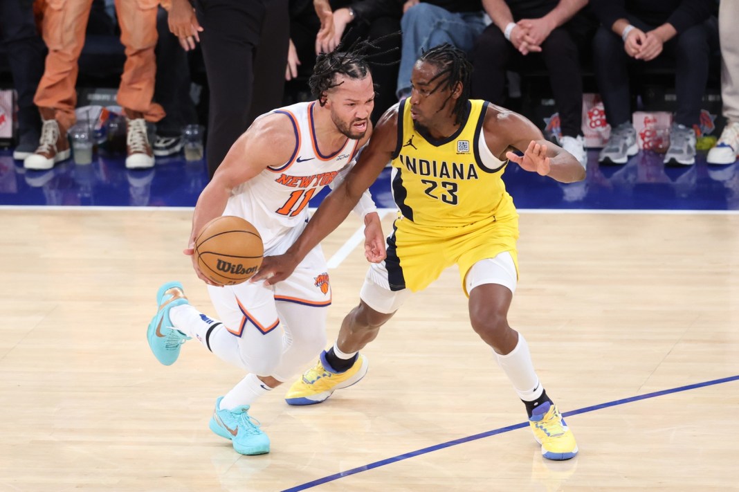 Knicks superstar Jalen Brunson drives against Pacers guard Aaron Nesmith during the 2024-25 Eastern Conference Finals.
