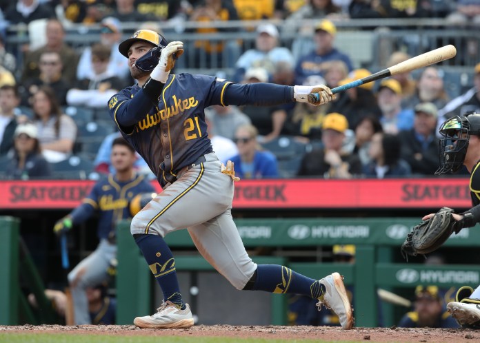 Milwaukee Brewers third baseman Caleb Durbin (21) hits a single during the seventh inning of the game against the Pittsburgh Pirates at PNC Park in Pittsburgh, Pennsylvania, on May 24, 2025.
