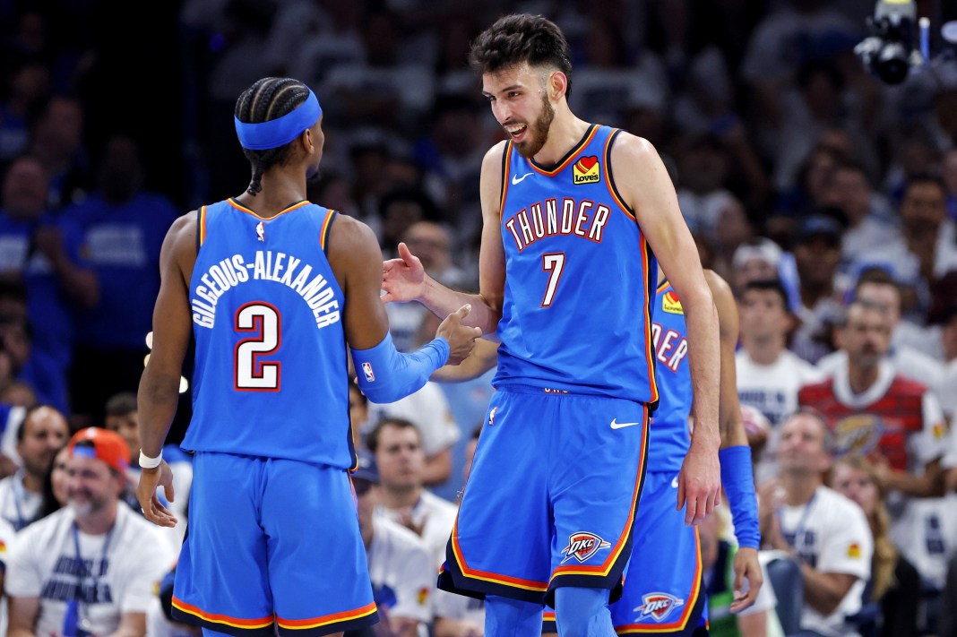 Thunder stars Shai Gilgeous-Alexander and Chet Holmgren celebrate during a series with the Timberwolves in the 2024-25 Western Conference Finals.
