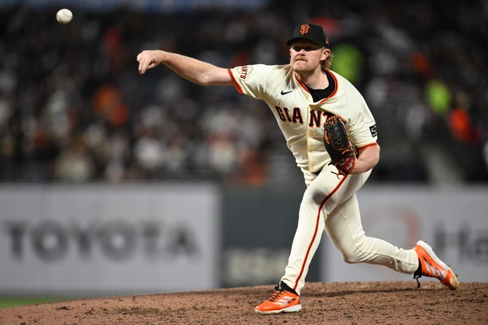 San Francisco Giants starting pitcher Logan Webb (62) delivers a pitch during the sixth inning of the game against the Milwaukee Brewers at Oracle Park in San Francisco, California, on April 23, 2025.