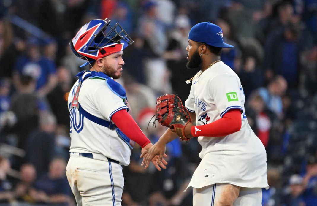 Toronto Blue Jays catcher Alejandro Kirk (30) celebrates with first baseman Vladimir Guerrero Jr. (27) after a win over the Tampa Bay Rays at Rogers Centre in Toronto, Ontario, on May 14, 2025.