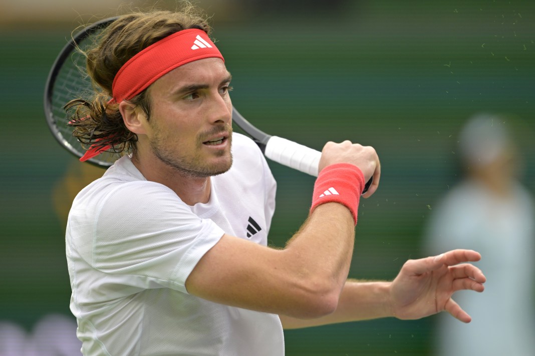 Stefanos Tsitsipas hits a shot during the 2025 BNP Paribas Open in Indian Wells.