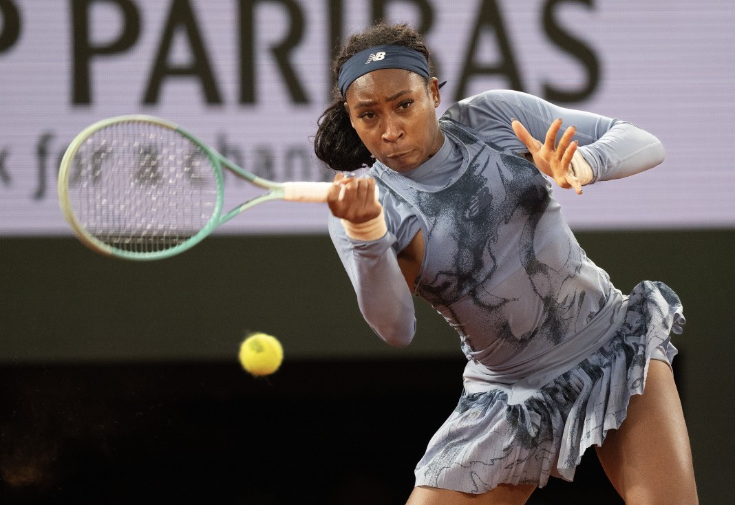 Coco Gauff hits a forehand against Madison Keys at the 2025 French Open at Roland Garros.
