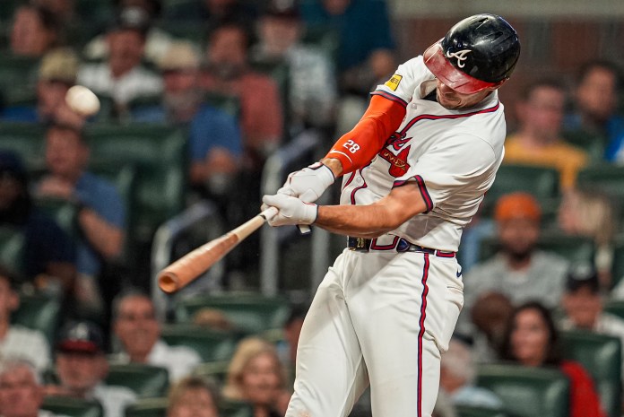 Atlanta Braves first baseman Matt Olson (28) hits a home run against the New York Mets during the seventh inning at Truist Park in Cumberland, Georgia, on June 18, 2025.