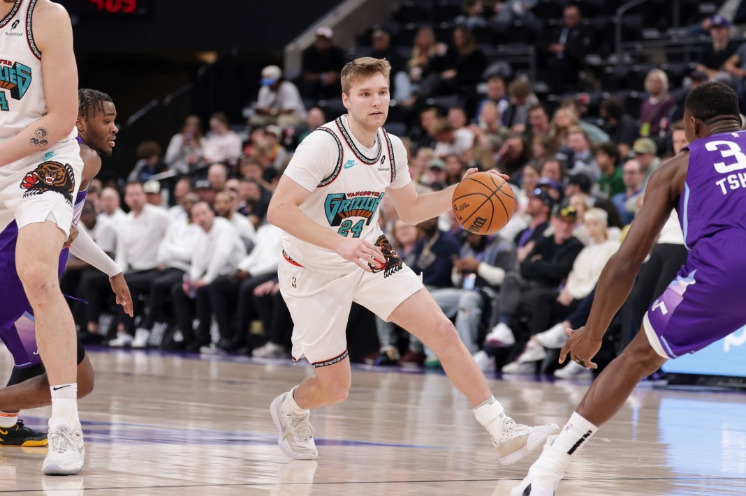 Grizzlies guard Cam Spencer drives to the basket against the Jazz during the 2024-25 NBA season.