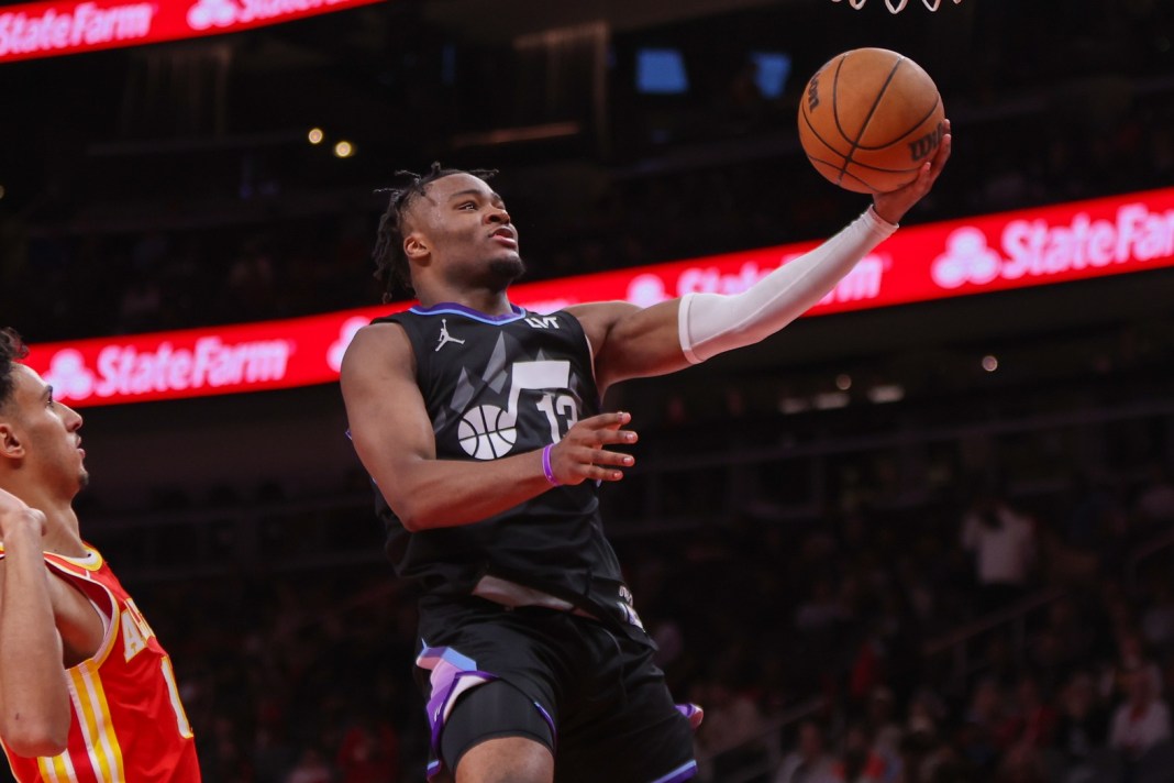 Jazz guard Isaiah Collier goes for a layup against the Hawks during the 2024-25 NBA season.