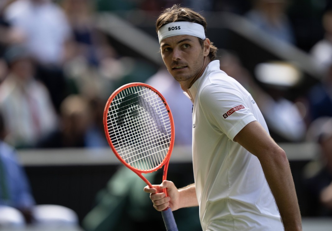 Taylor Fritz celebrates a win over Alejandro Davidovich Fokina at Wimbledon in 2025.
