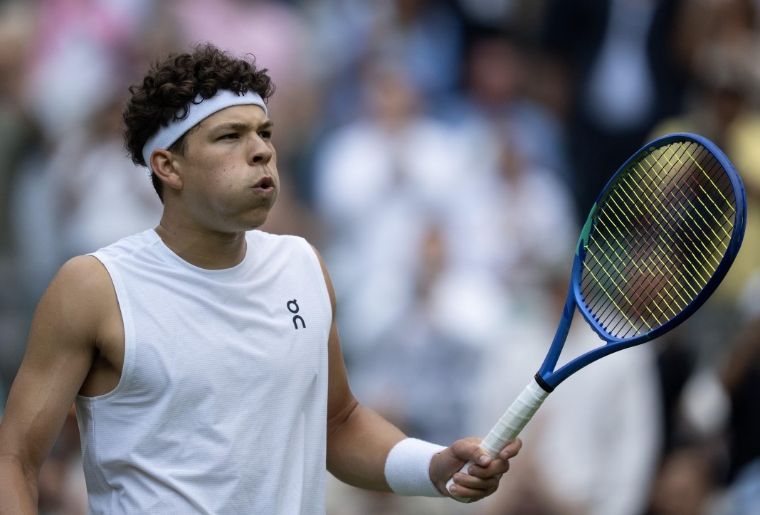 Ben Shelton celebrates a win over Marton Fucsovics in Wimbledon in 2025.