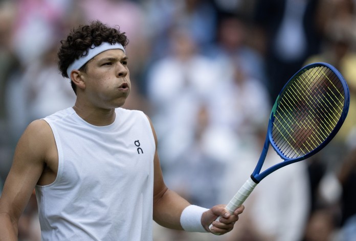 Ben Shelton celebrates a win over Marton Fucsovics in Wimbledon in 2025.