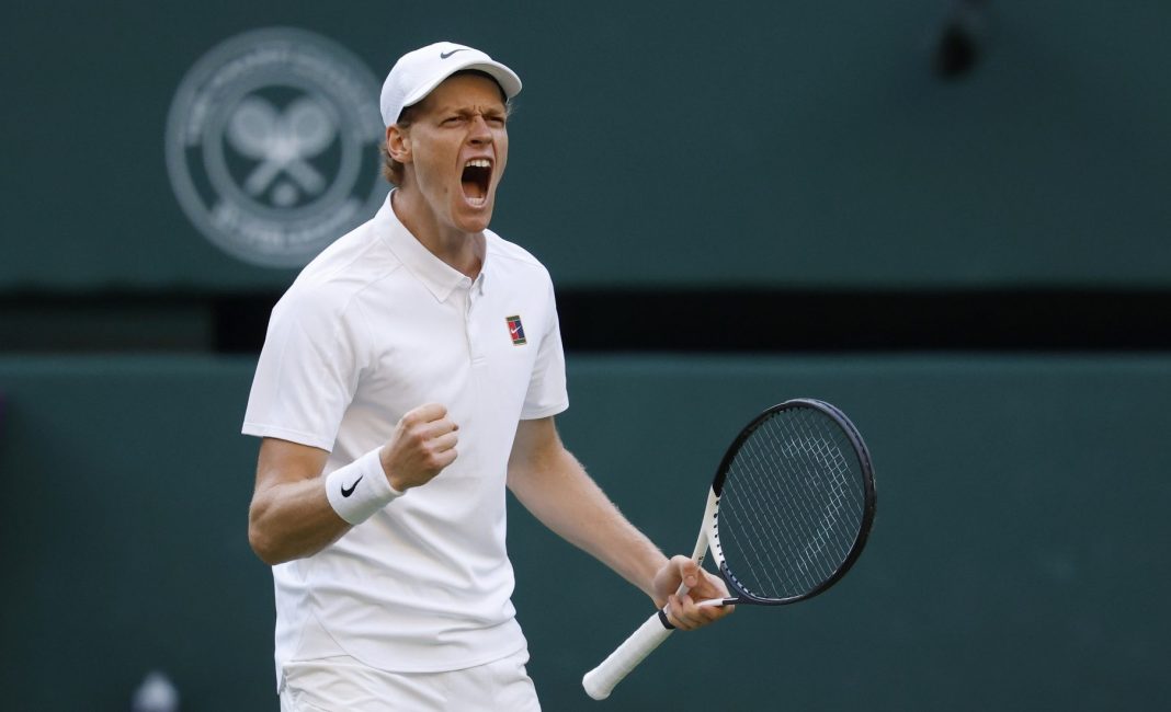 Jannik Sinner celebrates a point against Grigor Dimitrov at Wimbledon in 2025.