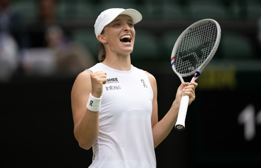 Iga Swiatek celebrates a win over Liudmila Samsonova in the 2025 Wimbledon quarterfinals.