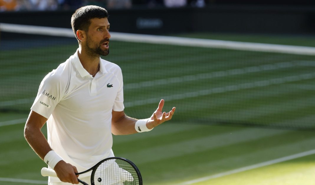 Novak Djokovic yells to his team during a match against Flavio Cobolli at Wimbledon in 2025.