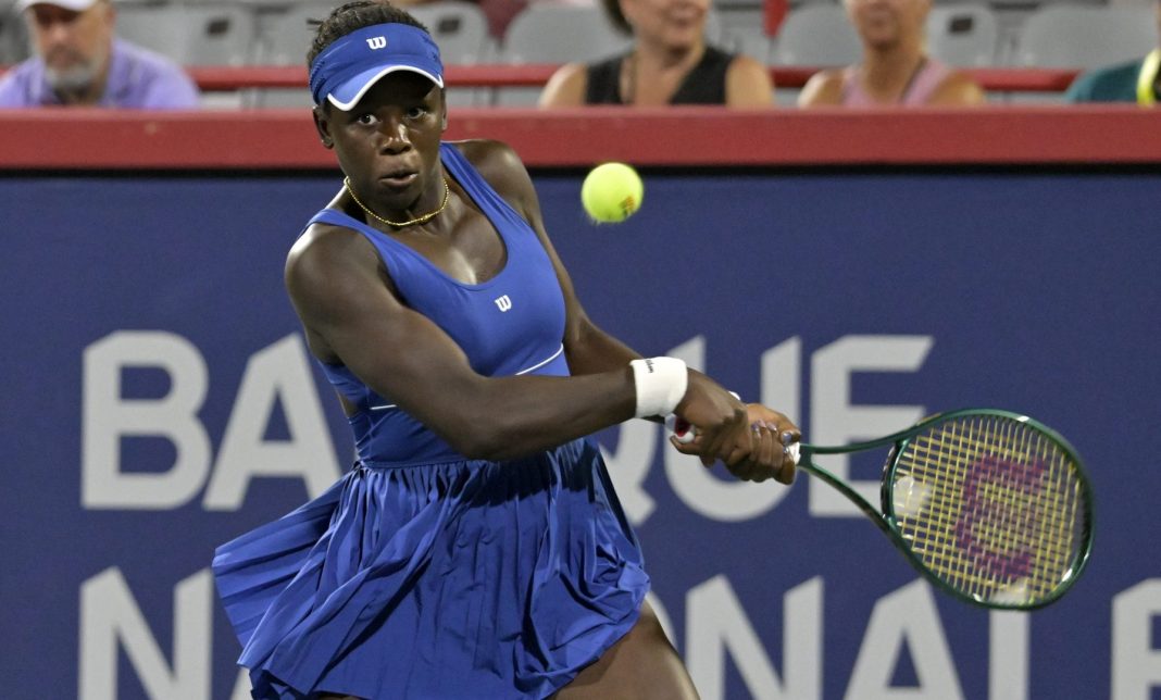 Victoria Mboko hits a backhand against Sofia Kenin at the 2025 National Bank Open in Montreal.