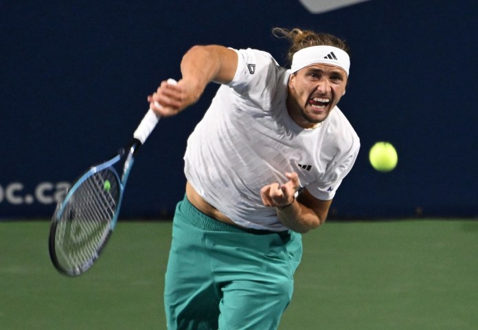 Alexander Zverev serves against Matteo Arnaldi at the 2025 National Bank Open in Toronto.