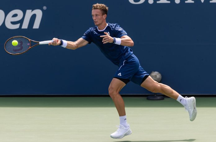 Jiri Lehecka hits a forehand in his match against Raphael Collignon at the 2025 US Open.