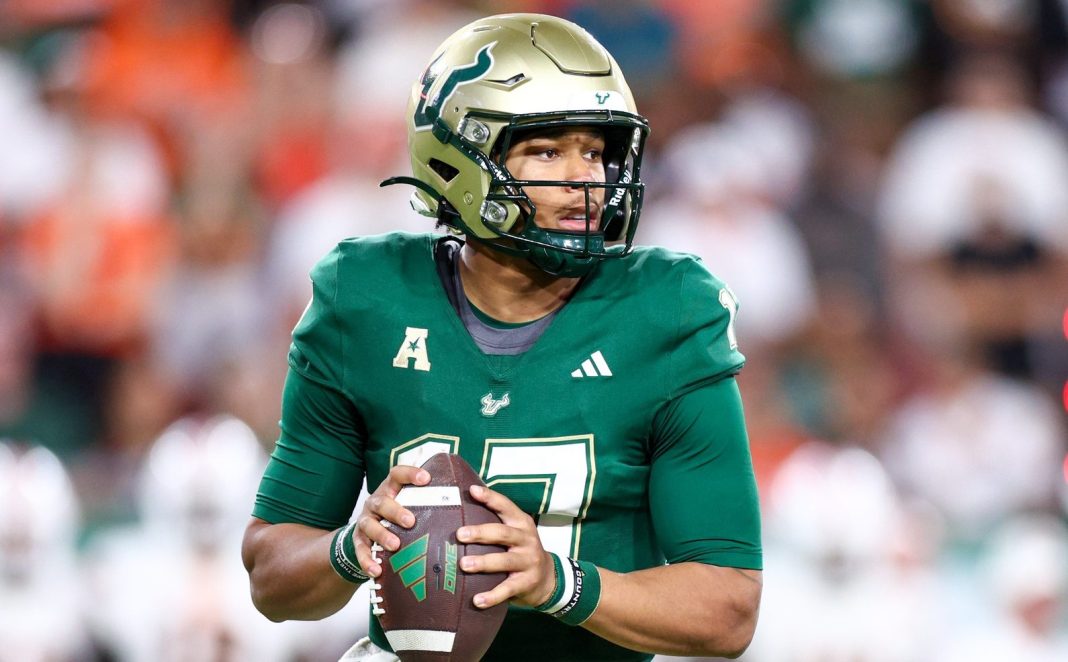 South Florida quarterback Byrum Brown looks to throw against Miami during the 2024 college football season.