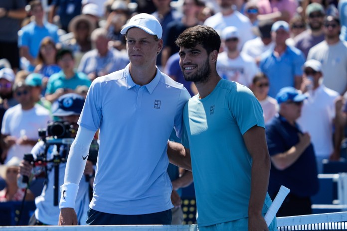 Jannik Sinner and Carlos Alcaraz pose for a picture before their match in the 2025 Cincinnati final.