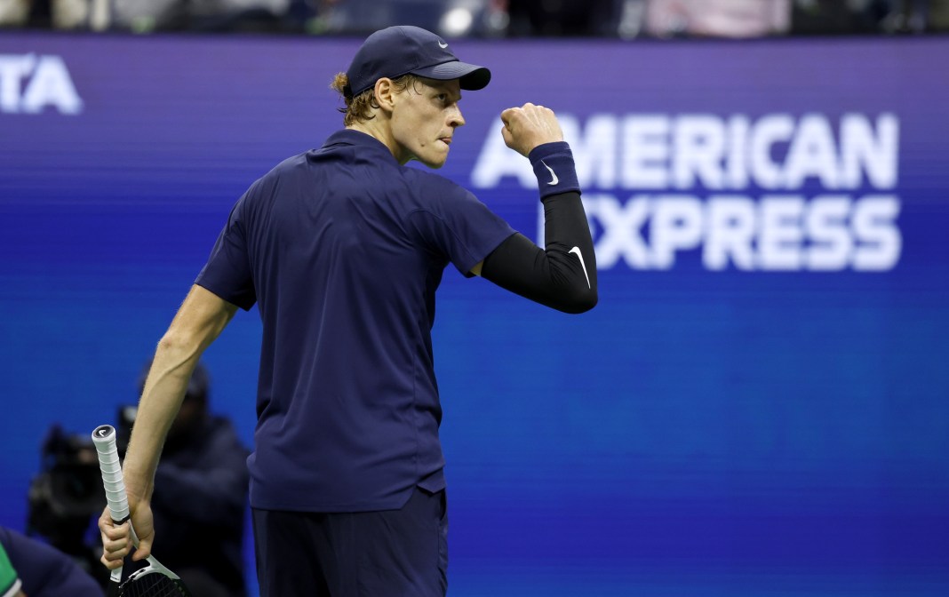 Jannik Sinner celebrates a big point against Lorenzo Musetti in the 2025 US Open quarterfinals.