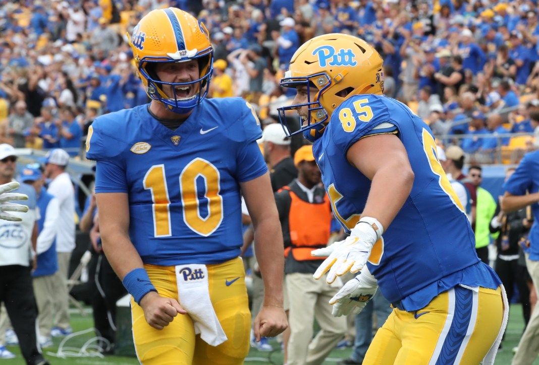 Pittsburgh quarterback Eli Holstein celebrates with tight end Josh Altsman during the 2025 college football season.