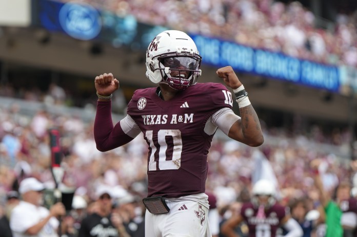 Texas A&M quarterback Marcel Reed celebrates a play against Utah State during the 2025 college football season.
