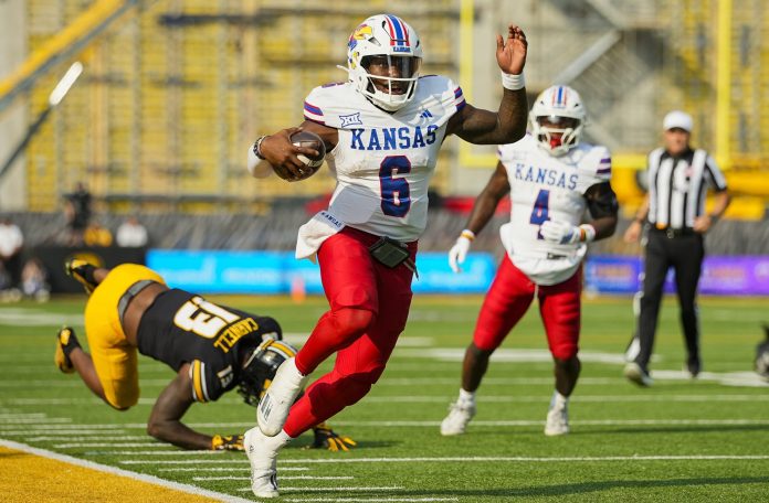 Kansas quarterback Jalon Daniels runs against Missouri during the 2025 college football season.