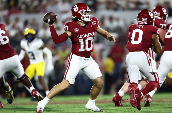 Oklahoma quarterback John Mateer throws a pass against Michigan during the 2025 college football season.