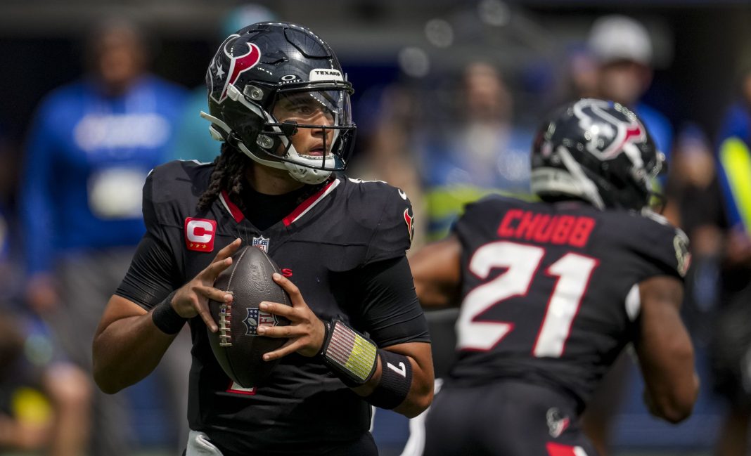 Texans quarterback C.J. Stroud looks to throw against the Rams during the 2025 NFL season.