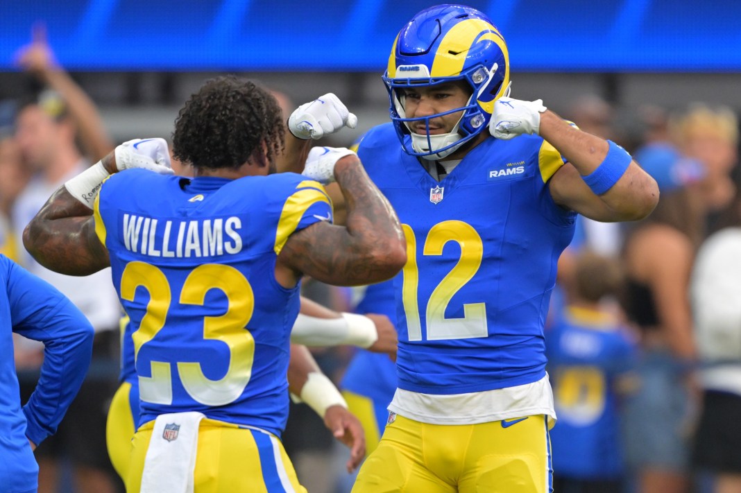 Rams star Puka Nacua flexes with Kyren Williams during a meeting with the Colts in the 2025 NFL season.