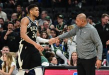 NBA Picks & Predictions Today (Oct. 24): Best Bets on Sides & Totals Bucks star Giannis Antetokounmpo high fives Doc Rivers during the 2024-25 NBA Playoffs.