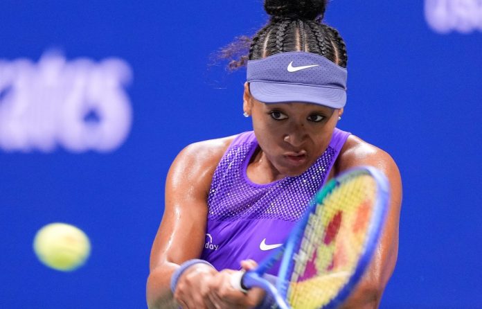 Naomi Osaka hits a backhand against Amanda Anisimova at the 2025 US Open.