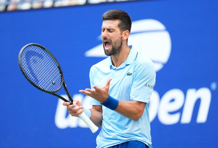Novak Djokovic reacts to a point against Carlos Alcaraz during the 2025 US Open.