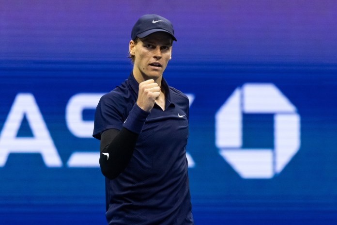 Jannik Sinner fist pumps after a win over Felix Auger Aliassime at the 2025 US Open.