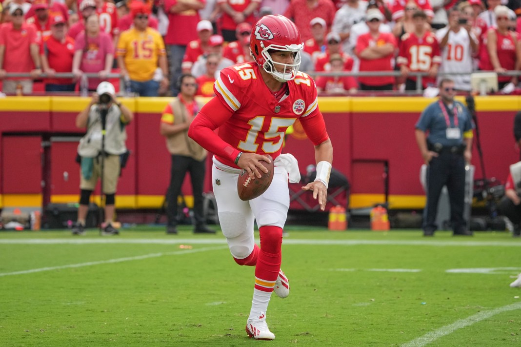 Chiefs quarterback Patrick Mahomes looks to make a play against the Eagles during the 2025 NFL season.