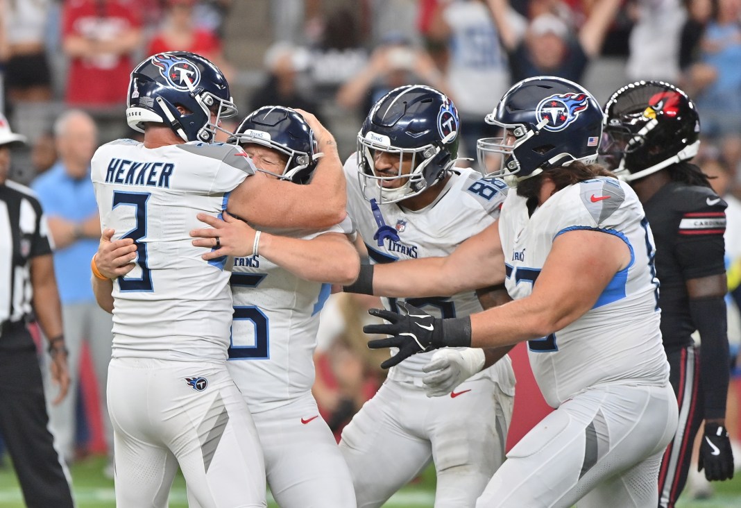 Titans celebrate upset of Cardinals.