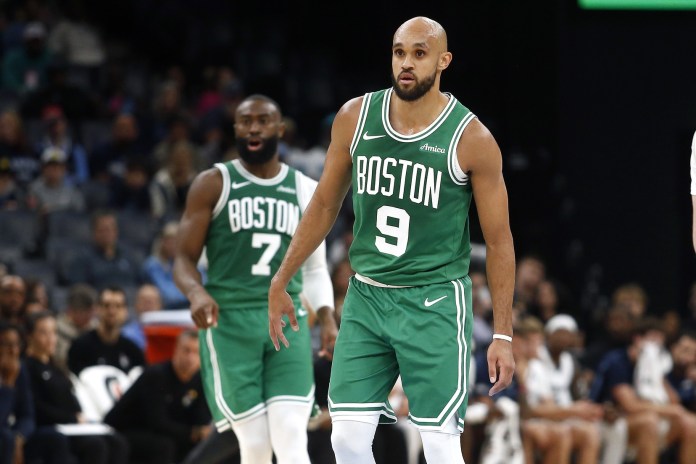 Celtics stars Derrick White and Jaylen Brown look to defend against the Grizzlies during the 2025-26 NBA preseason.