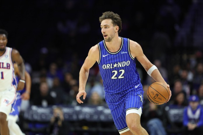 Magic star Franz Wagner tries to make a play against the 76ers during the 2025-26 NBA preseason.