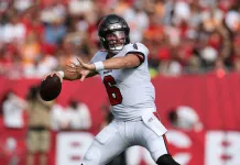 Week 12 NFL Odds and Matchups Report Buccaneers star Baker Mayfield throws a pass against the 49ers during the 2025 NFL season.