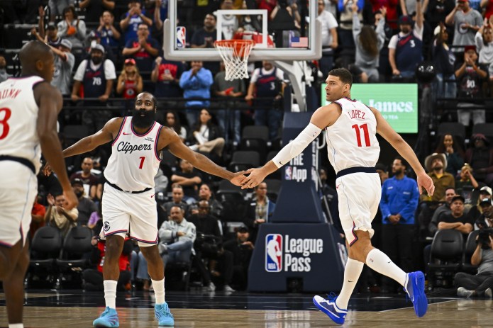 Clippers star James Harden high fives Brook Lopez during the 2025-26 NBA preseason.