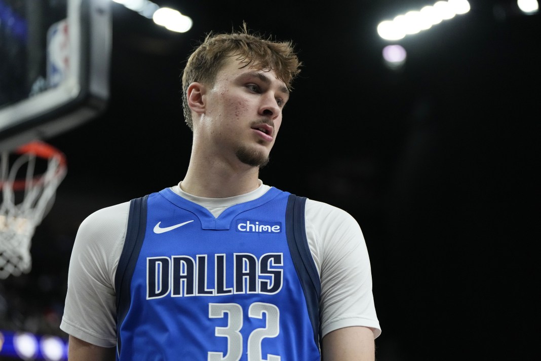 Mavericks rookie Cooper Flagg looks on against the Lakers during a 2025-26 NBA preseason game.