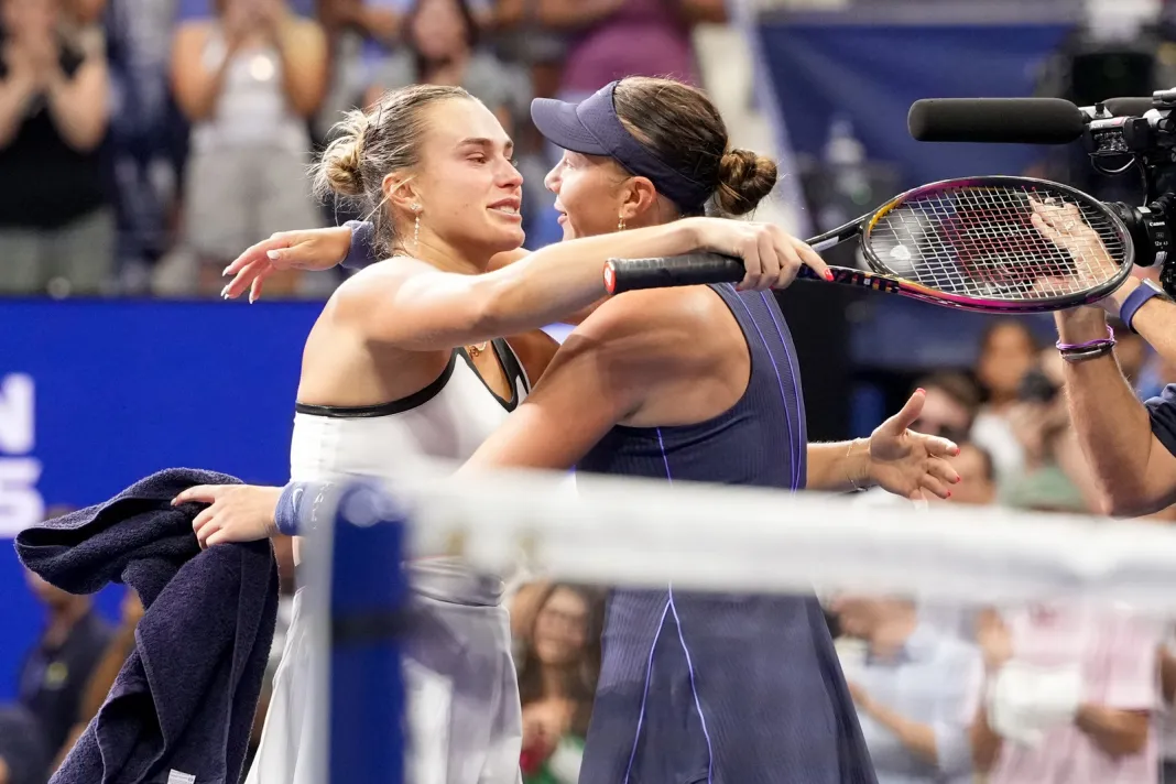 Tennis: US Open Aryna Sabalenka and Amanda Anisimova embrace at the net at the 2025 US Open.