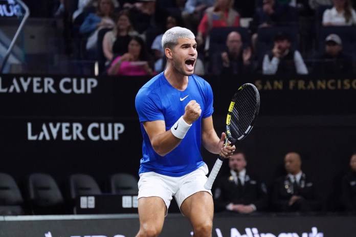 Carlos Alcaraz celebrates a point in a doubles match with Casper Ruud at the 2025 Laver Cup.