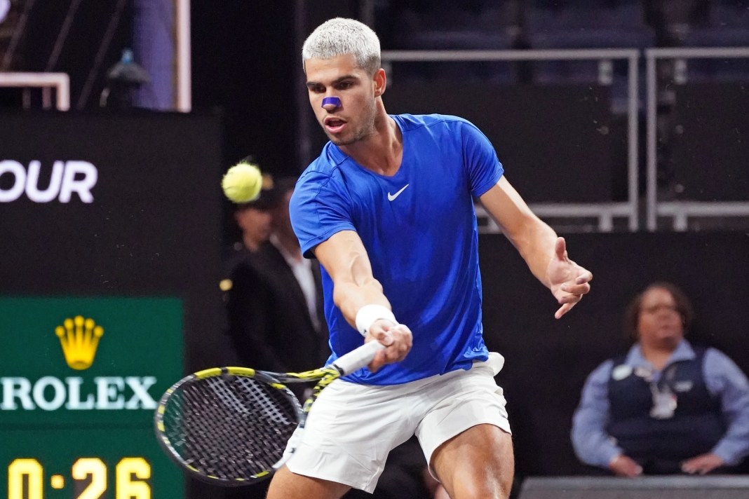 Carlos Alcaraz hits a drop shot against Francisco Cerundolo at the 2025 Laver Cup.