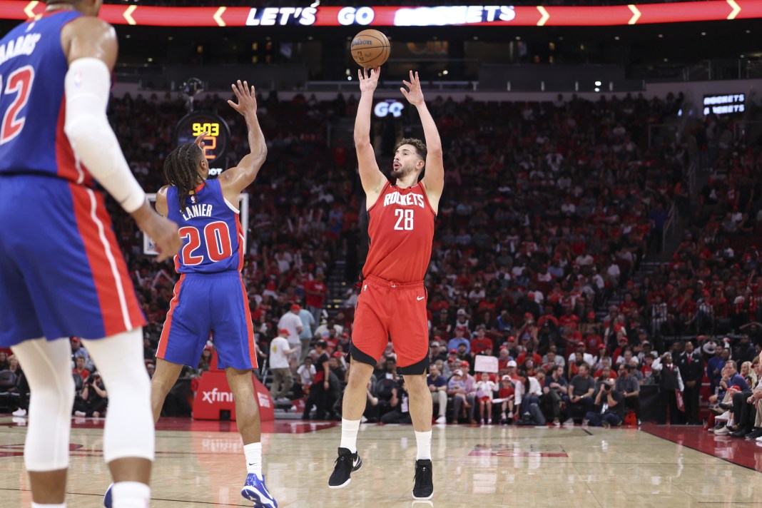 Rockets star Alperen Sengun takes a jumper against the Pistons during the 2025-26 NBA season.