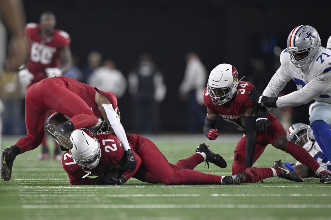 Arizona Cardinals linebacker Akeem Davis-Gaither (27) recovers a fumble.