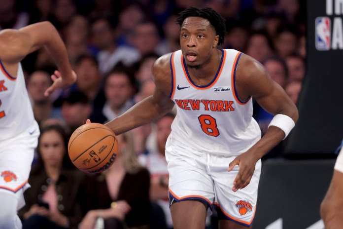 Knicks forward OG Anunoby dribbles the ball up against the Timberwolves during the 2025-26 NBA season.