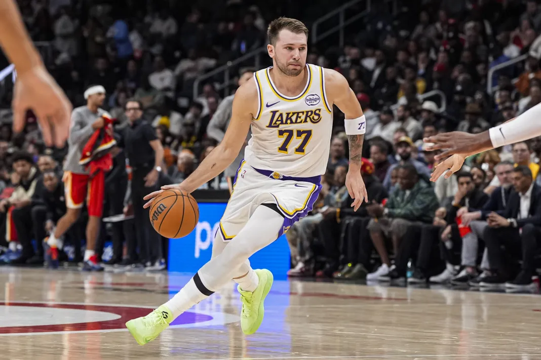 NBA: Los Angeles Lakers at Atlanta Hawks Lakers superstar Luka Doncic drives against the Hawks during the 2025-26 NBA season.