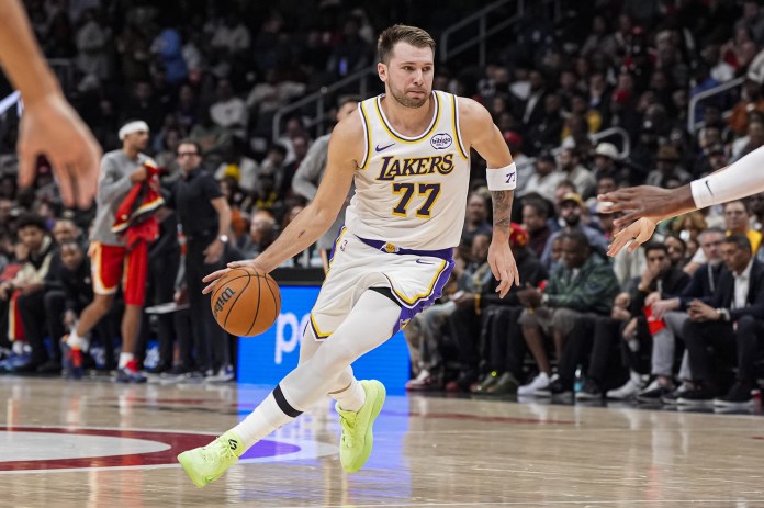 Lakers superstar Luka Doncic drives against the Hawks during the 2025-26 NBA season.