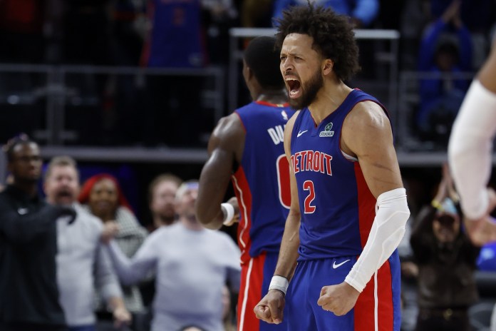 Pistons star Cade Cunningham celebrates a play against the Wizards during the 2025-26 NBA season.