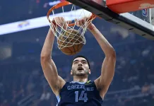 NBA Predictions Today: Best Bets and Player Props for Saturday, November 22 Grizzlies center Zach Edey dunks against the Cavaliers during the 2025-26 NBA season.