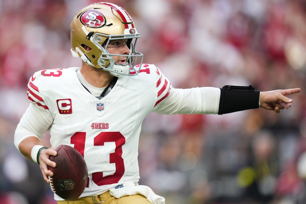 49ers quarterback Brock Purdy looks to throw against the Cardinals during the 2025 NFL season.